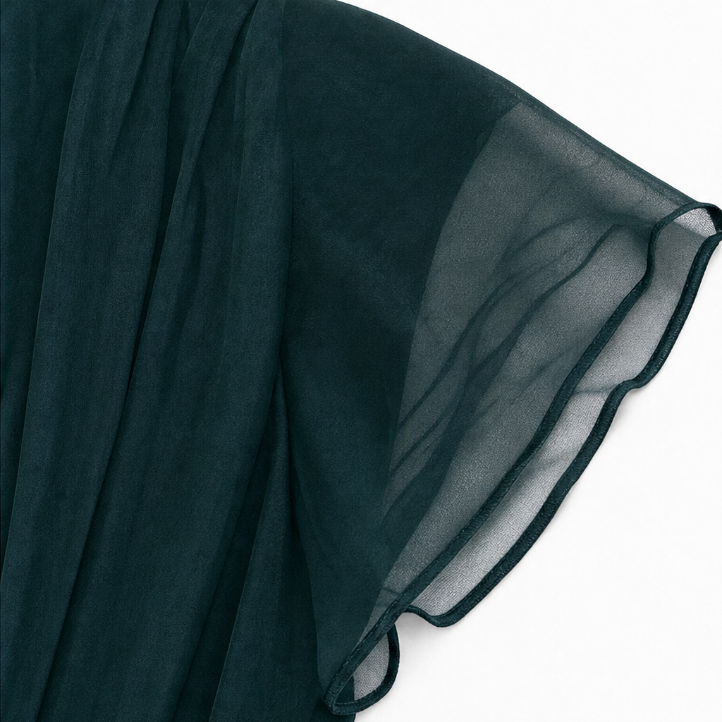 Draperad maxiklänning i elegant utförande för högtidliga tillfällen