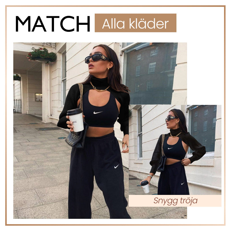 "Coltröja med hög hals och loose bloomer-ärmar, eleganta detaljer för chic look. Perfekt för dammode, olika färgval."