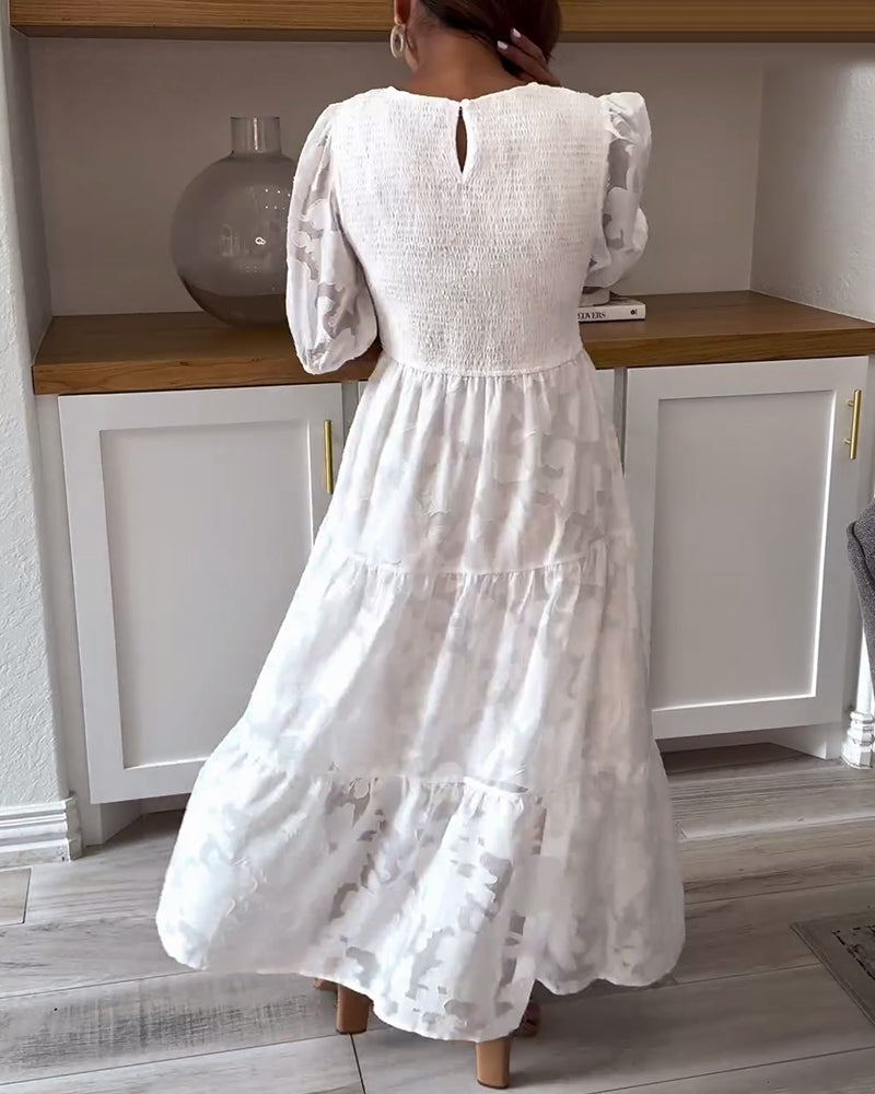 Elegant klänning med mellanärm och vit spets