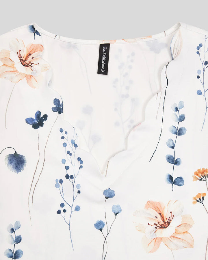 Kortärmad topp med v-ringad spets med blommönster