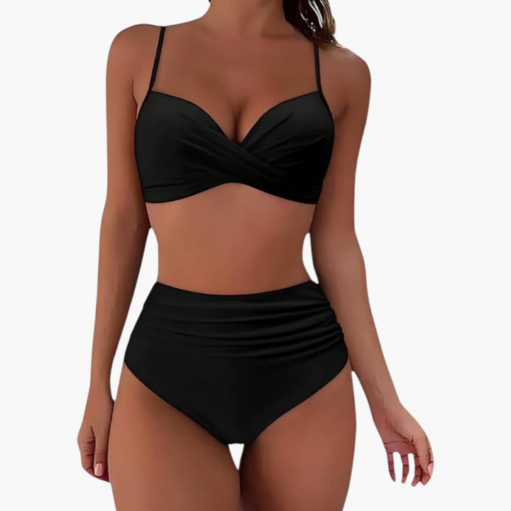 Modernt högmidjat bikini-set för dam med justerbara axelband. Bekväma badkläder.
