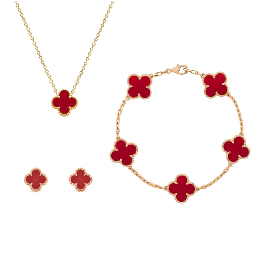 Vitt guldpläterat Aurora klaver smyckesset. Elegant damhalsband, armband & örhängen för alla tillfällen.