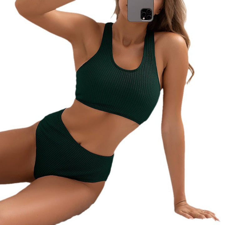 Dam sportbikini med hög midja, perfekt för simning och vattenaktiviteter. Modern och snabbtorkande design.