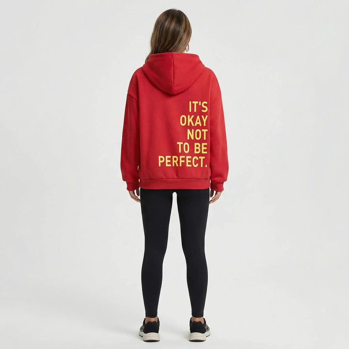Sidovy av dam hoodie Charlie. Visar bekväm passform och avslappnad stil.