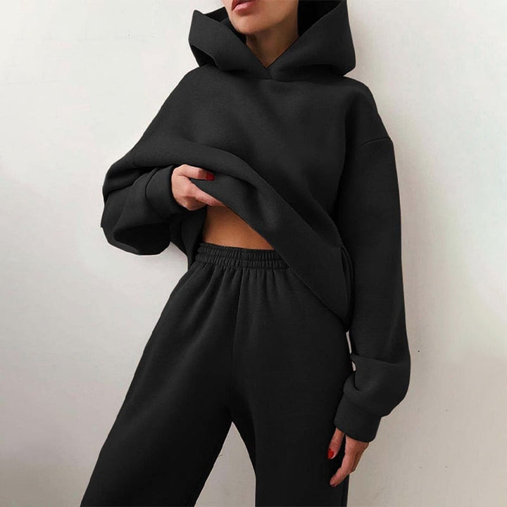 Kvinnors mysiga loungewear-set med huva, skön komfort för hemmabruk.