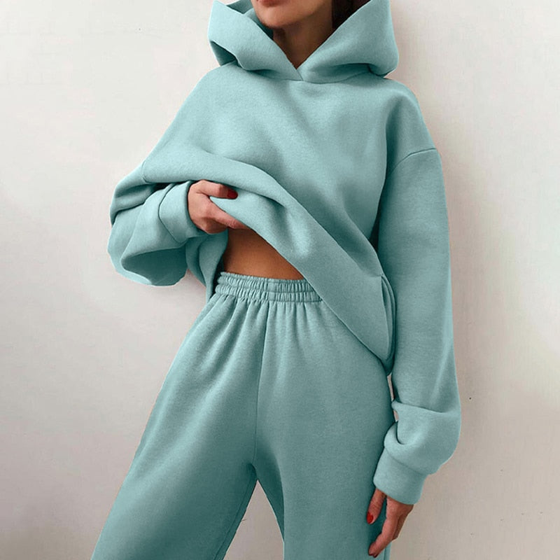 Höst/vinter dam loungewear-set med huva, perfekt för avslappnade dagar.