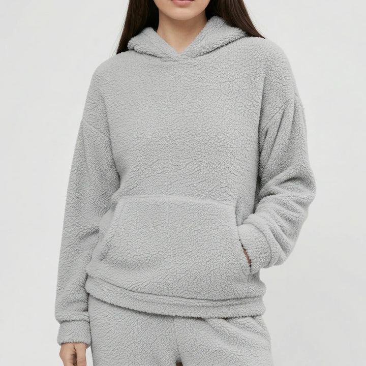 Bekvämt dam loungewear-set med huvtröja och känguruficka. Perfekt för avkoppling.