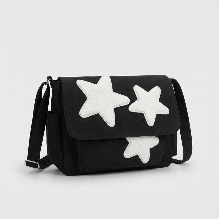 Snygg dam messenger väska med stjärnmönster. Praktisk, organiserad vardagsväska som crossbody-modell.