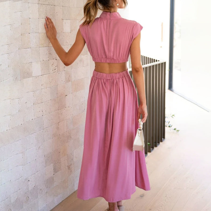 Elegant utskuren midiklänning för dam i rosa, baksida