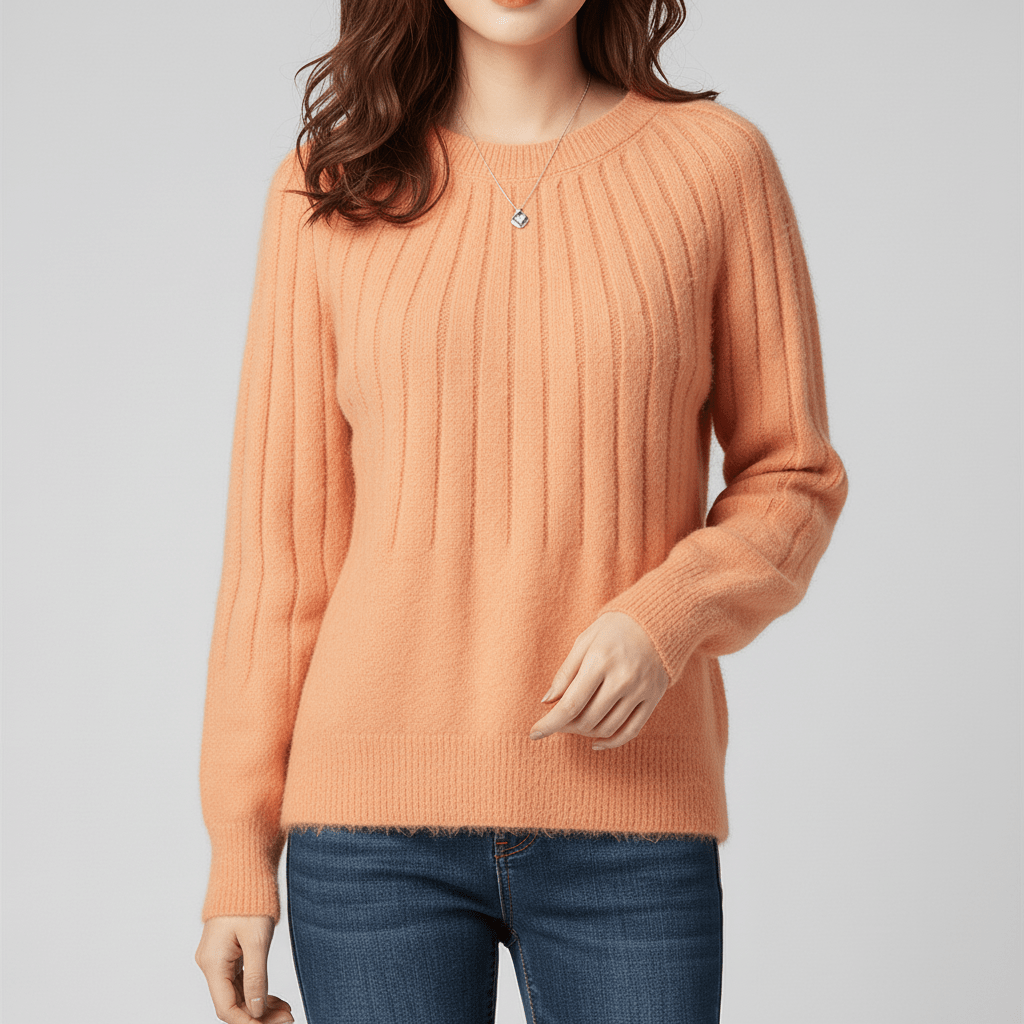 Långärmad damtröja med ribbdetaljer, mjuk och bekväm för en elegant och tidlös look.