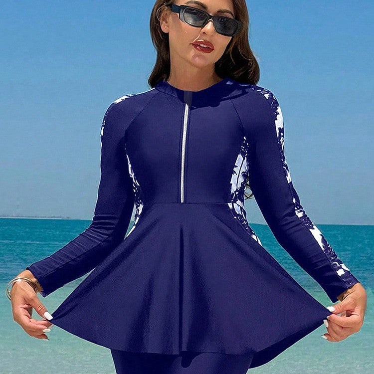Dam surfdräkt A-linje långa ärmar. Stilren baddräkt med UV-skydd för strand & vattensport.
