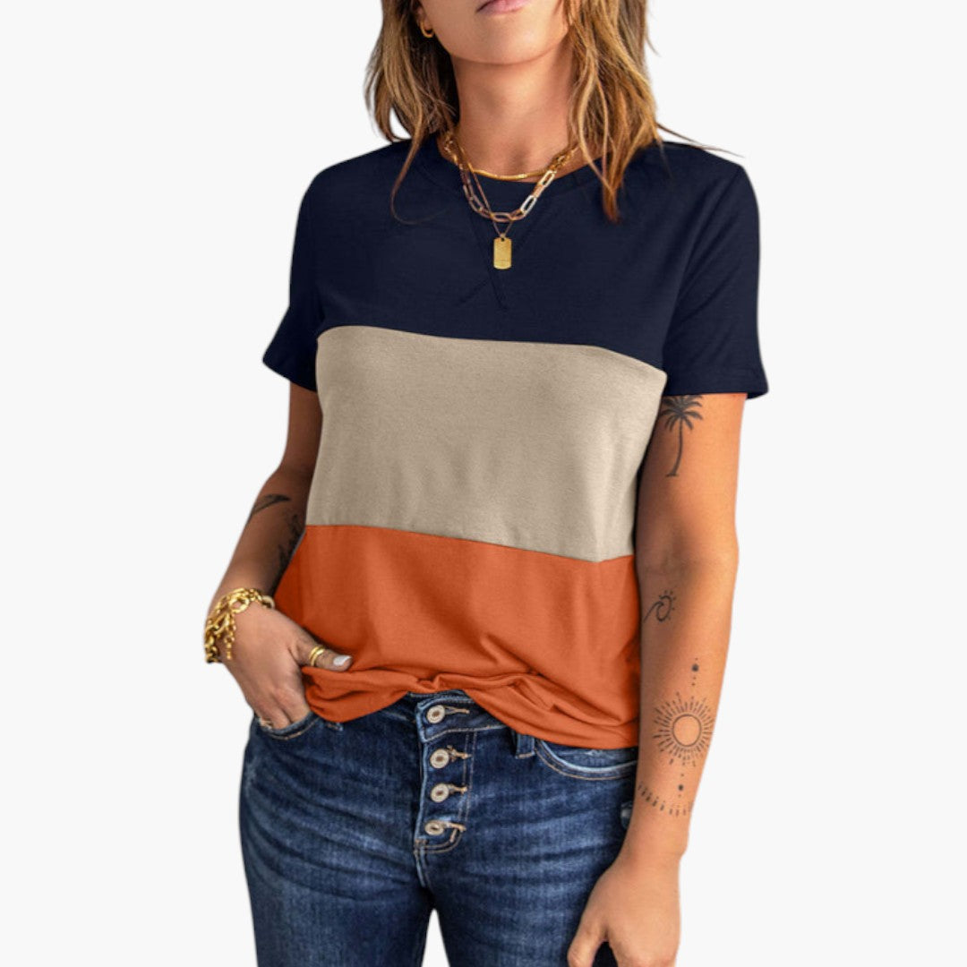 Modern dam t-shirt med sofistikerad paneldesign, rund hals. Bekväm kortärmad vardagsplagg för stilmedvetna.