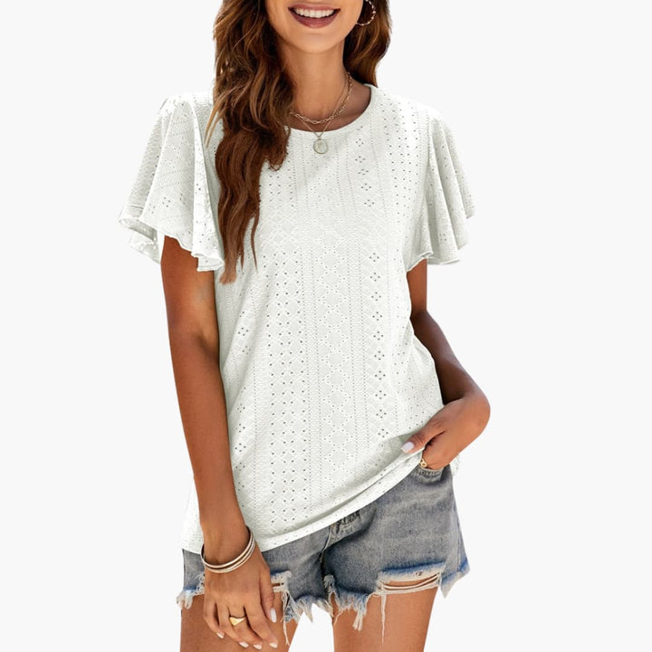 Casual dam t-shirt med rund hals och volangärmar. Mångsidig kortärmad topp för daglig användning.