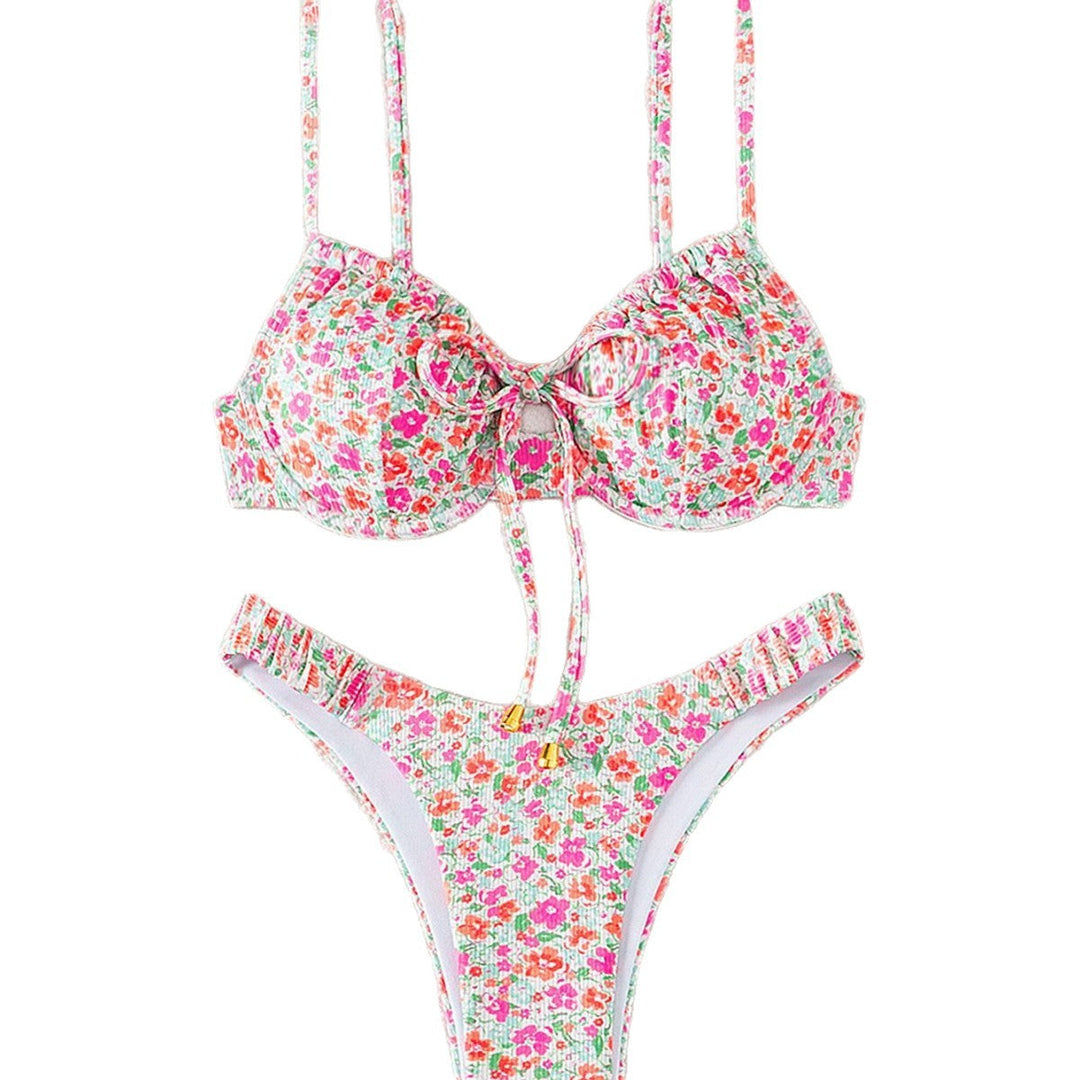Vikta dam triangelbikini med persika/rosa blommönster, ett elegant och justerbart badklädeset för sommar.