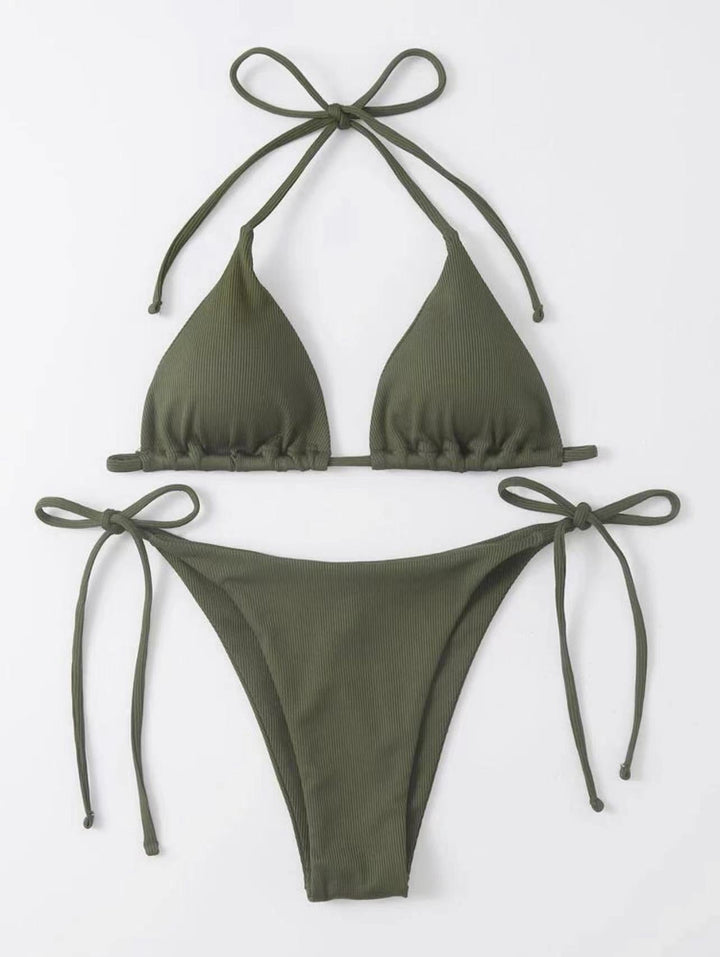 Bikini underdel för dam med justerbara sidoknutar. Kompletterar triangelbikini-setet perfekt.