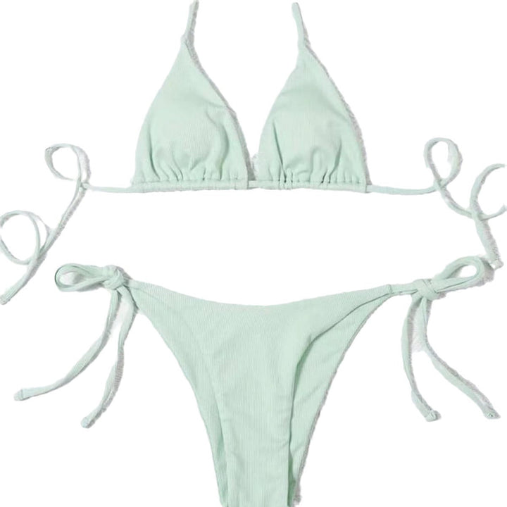 Dam bikini underdel med sidoknutar, matchande triangelbikini. Snabbtorkande strandmode för badsäsongen.