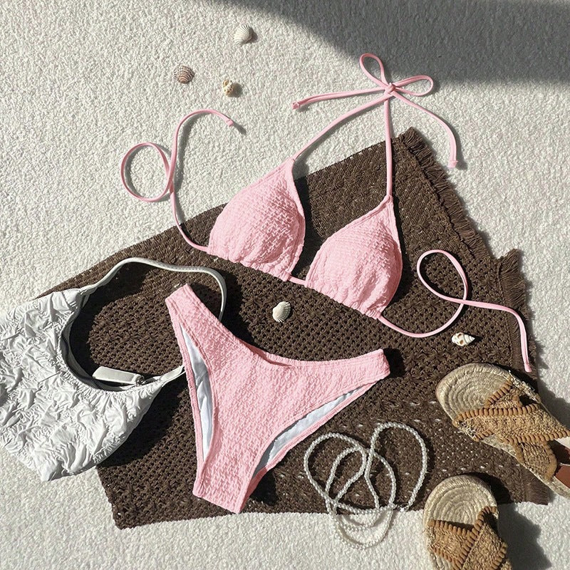 Snygg damtriangelbikini med textur, justerbara band ger flexibilitet. Trendiga badkläder.