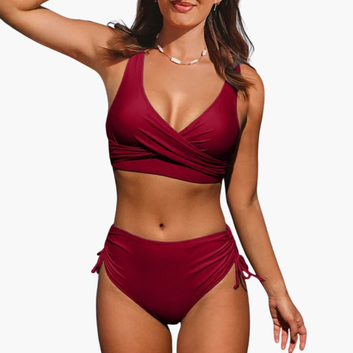 Tvådelat bikini-set för dam med trekantig bikinitopp och matchande badbyxor. Idealiskt för soliga dagar.