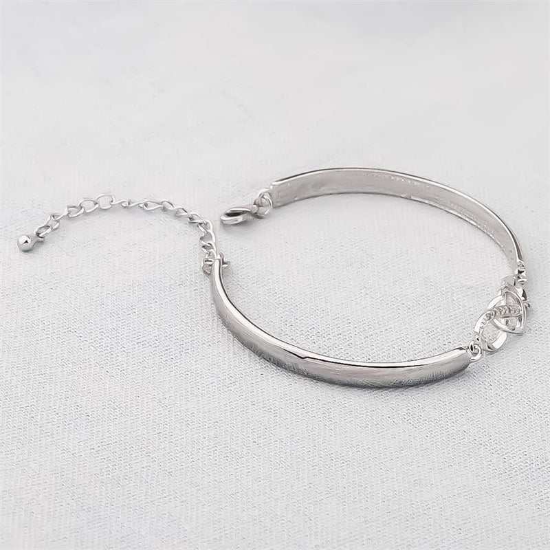 Armband i roseguld och silver med hjärtberlock för dam, elegant design och perfekt present till mamma.