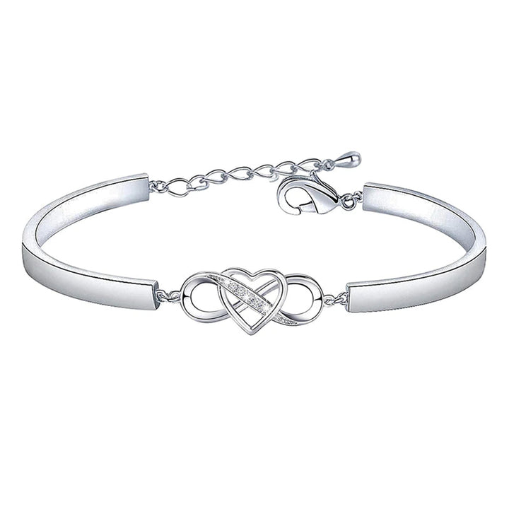 Armband i roseguld och silver med hjärtberlock för dam, elegant design och perfekt present till mamma.