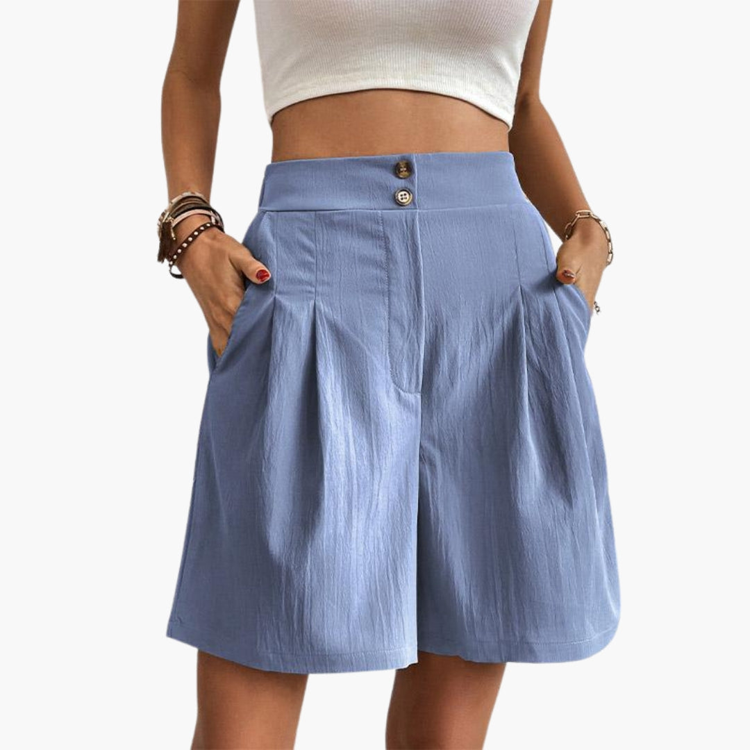 Eleganta veckade dambyxor med hög midja. Vida ben för maximal komfort och stil.