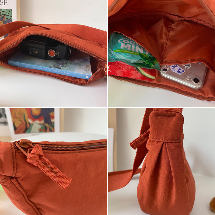 "Damer halvmåne crossbody-väska av slitstarkt nylon i gul färg med justerbar axelrem, stilren och praktisk."
