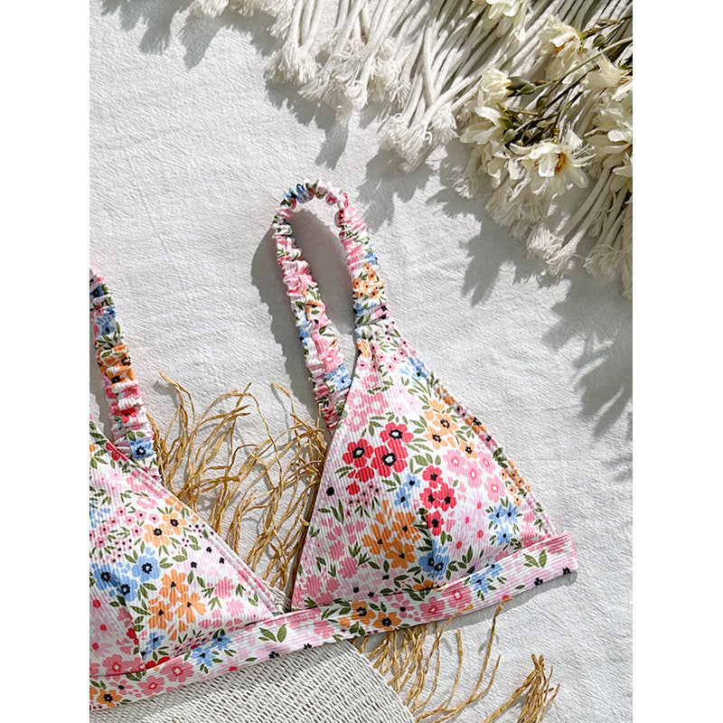 Blommönstrad triangeltopp för damer med justerbara band, idealisk badkläder för sommar och strandmode.
