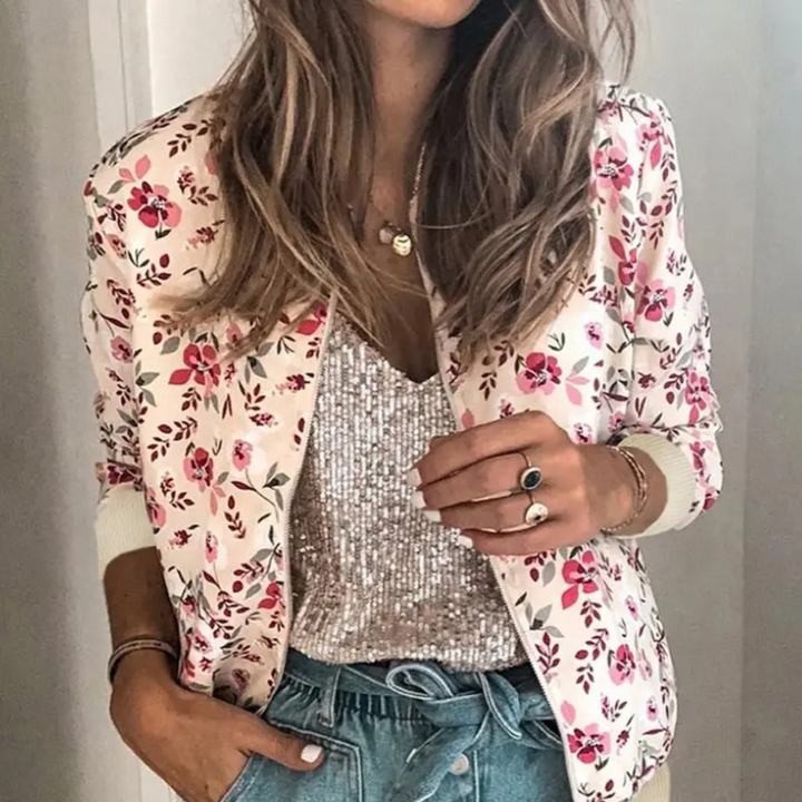 Snygg lättviktsjacka för dam med blommigt mönster och muddar
