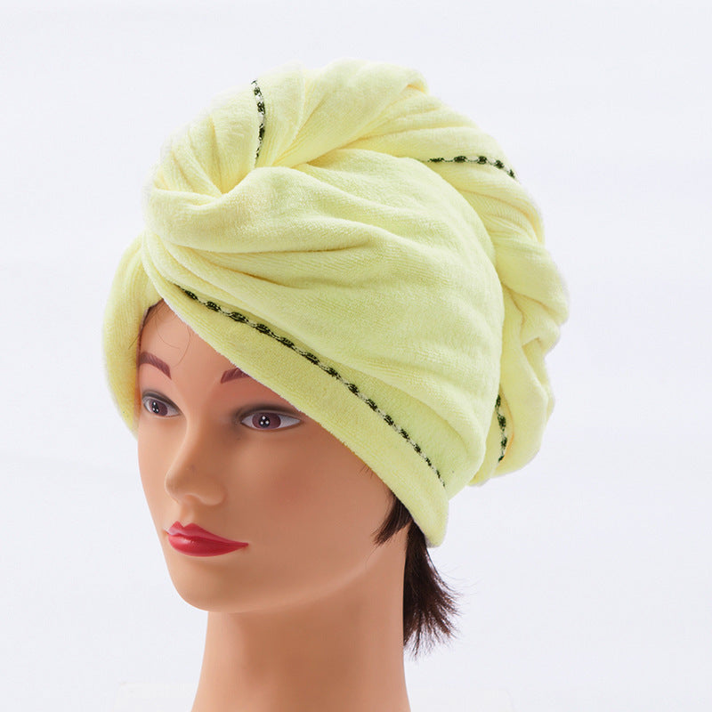 "Damhårduk i ljuslila mikrofiber, superabsorberande, elegant design, idealisk för snabb och skonsam hårtorkning."