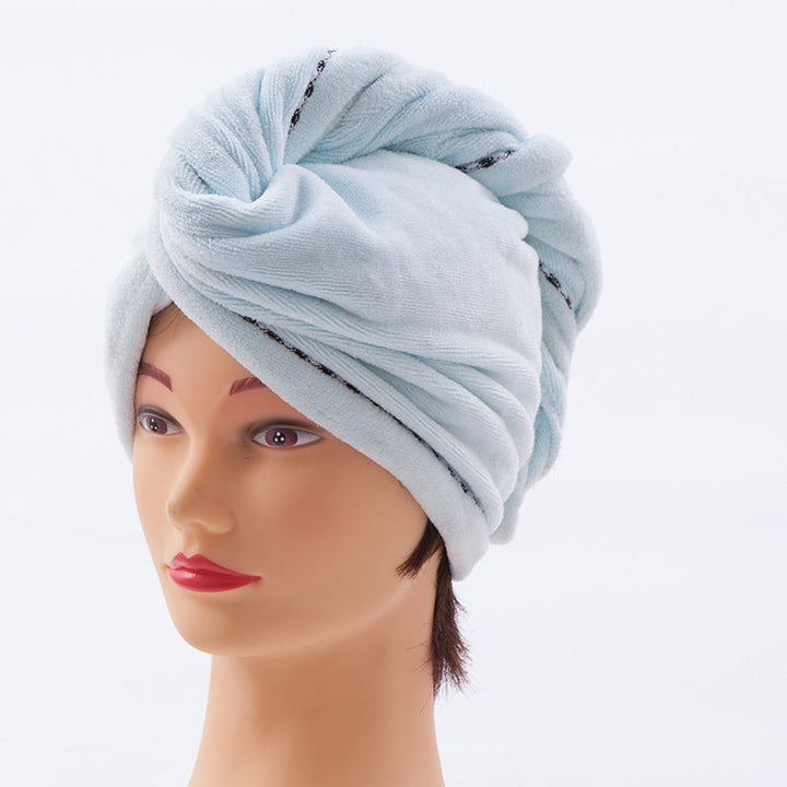 "Damhårduk i ljuslila mikrofiber, superabsorberande, elegant design, idealisk för snabb och skonsam hårtorkning."