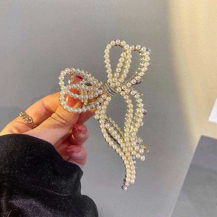 Damhårklämmor i strassmetall, guld och silver, elegant design, perfekt för stil och elegans, kvinnliga accessoarer.