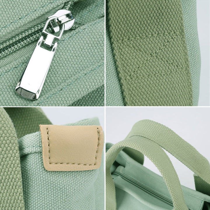 "Damhögkapacitets-canvasväska med flerficksdesign, färgstark och slitstark med säkra dragkedjor. Praktisk accessoar."