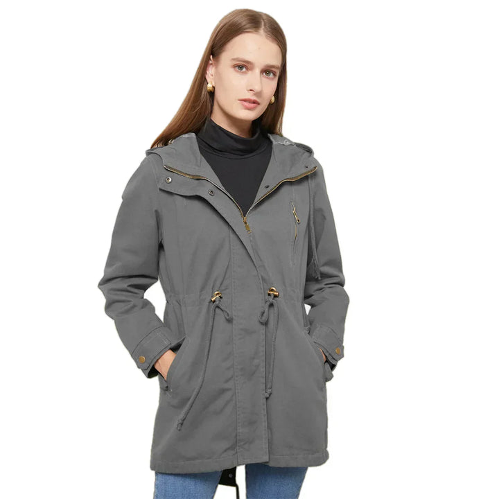 Snygg damhoodie med justerbar dragsko. Modern huvjacka som kombinerar stil & funktion.
