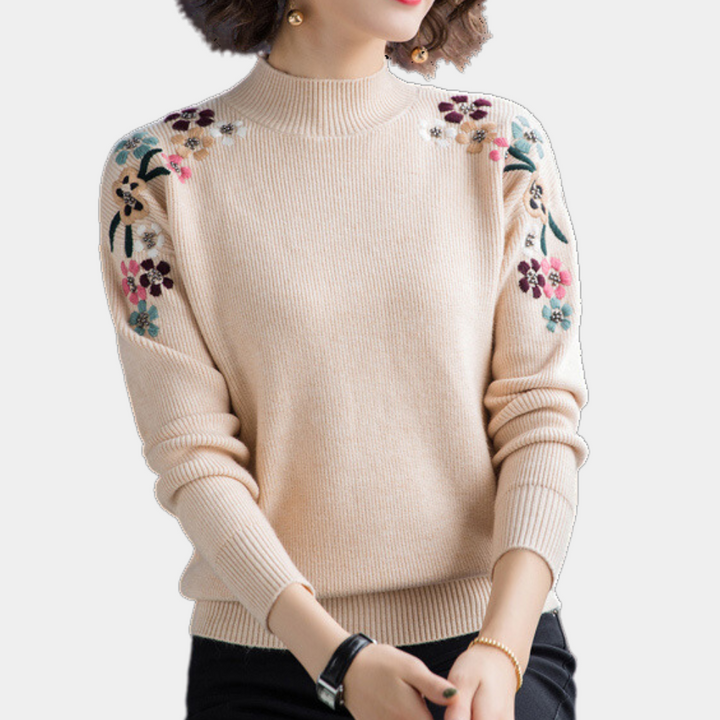 Höstmode: Damtröja med bekväm passform och trendigt blommönster i mjuk stickad kvalitet.