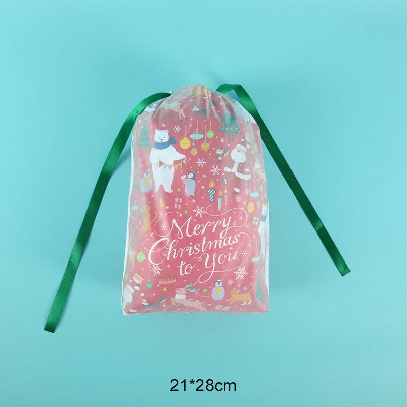 "Dekorativa julklappspåsar med dragsko och festliga motiv, perfekt för snabb och stilfull inpackning av julklappar."