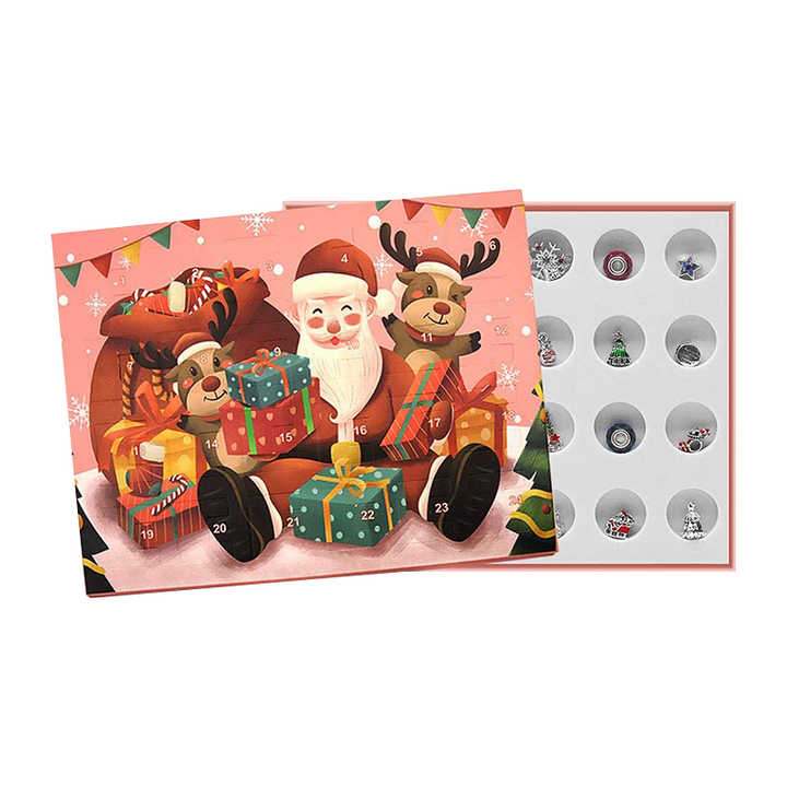 "DIY jularmband adventskalender för barn med charmarmband, snögubbe och jultomtemotiv i färgglad förpackning."