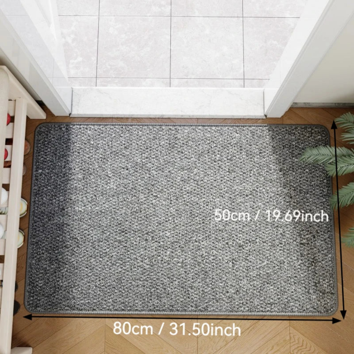 Närbild på slitstark dörrmatta i naturlig jute-look med struktur för entré