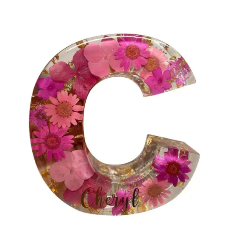 Personlig presentidé med blommor inneslutna i harts och integrerad LED