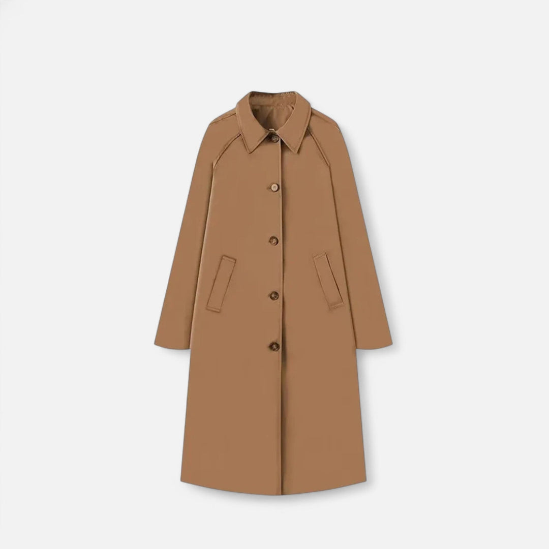 Brun damernas långa trench coat upphängd
