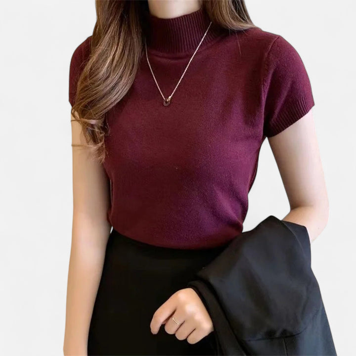 Närbild på textur och kvalitet hos kortärmad stickad turtleneck för dam