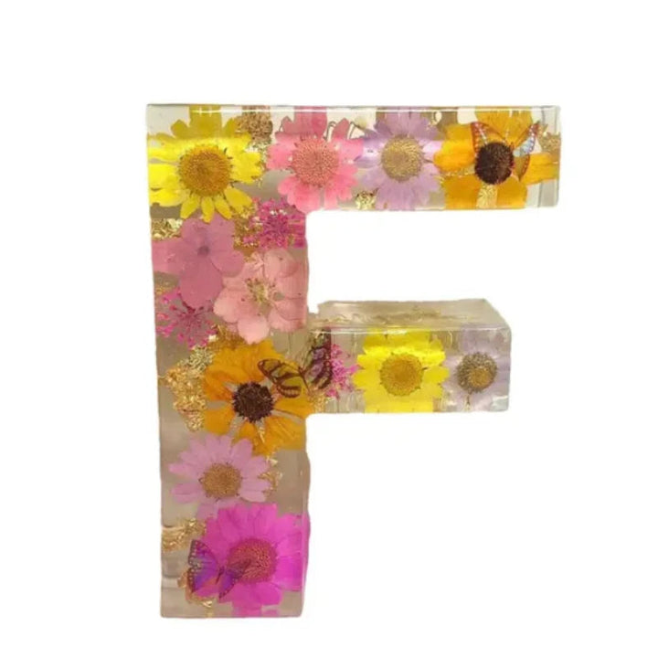 Modern nattlampa med blomsterdetaljer och varmt vitt LED-sken