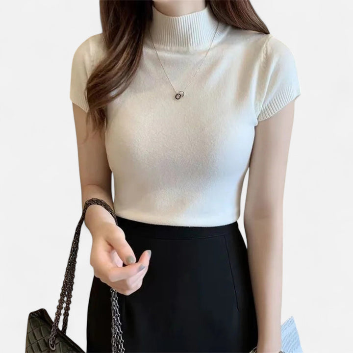 Kortärmad stickad turtleneck blus för dam i elegant design för vardagsmode