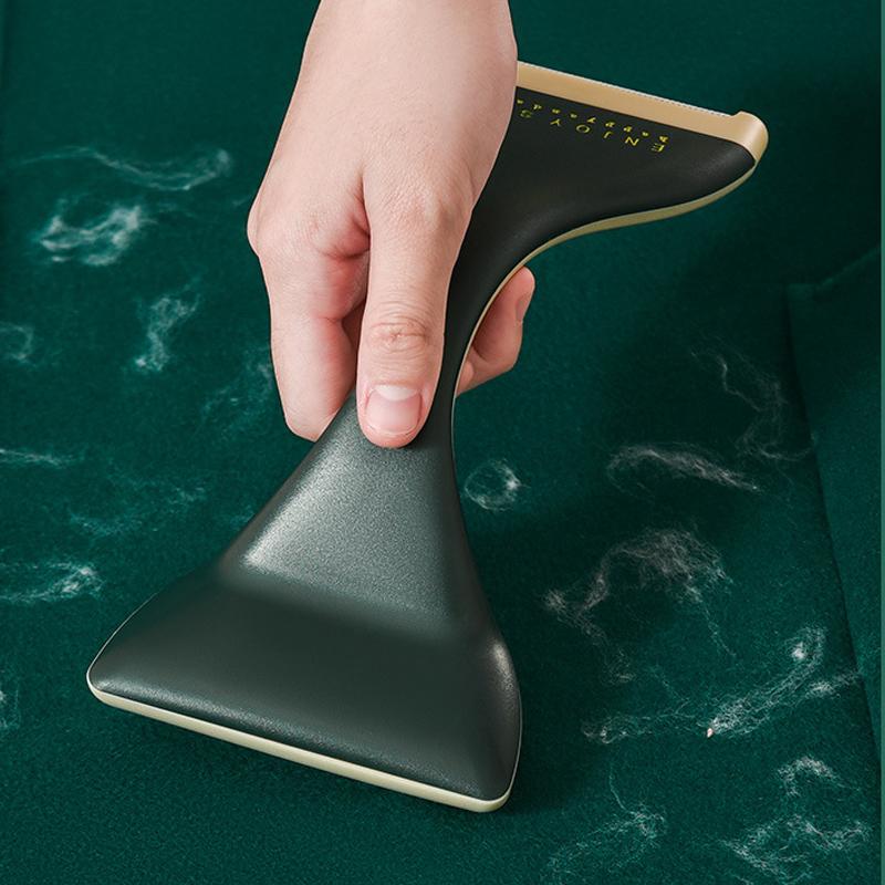 "Dubbelhuvud luddborttagare i grönt visar ergonomisk design och dubbla huvuden för effektiv luddborttagning."