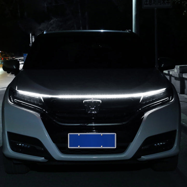 "Dynamisk LED-remsa för bilhuv, vattentät, lätt installation, ger bilen modern ljuseffekt, cool design, 1.8m silikon."