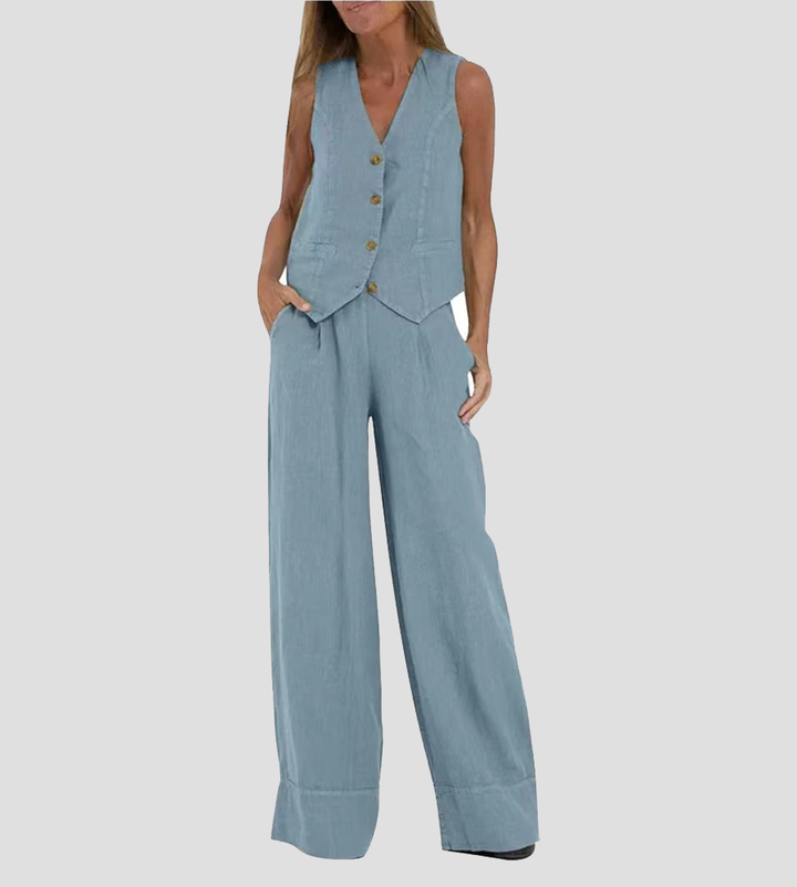 Stilren outfit med ärmlös väst och vida byxor för dam