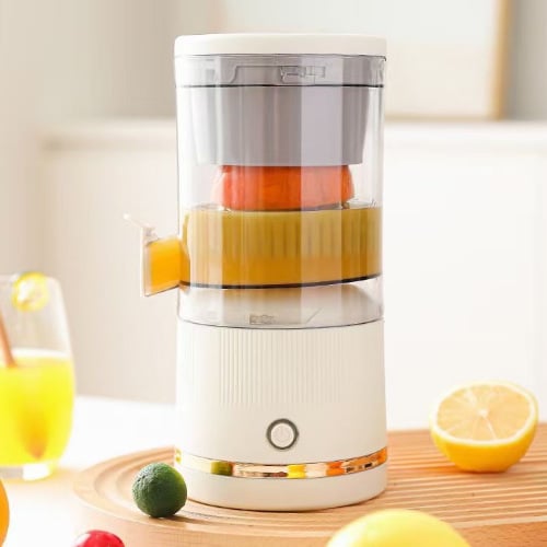 Vit bärbar mini juicepress på köksbänk