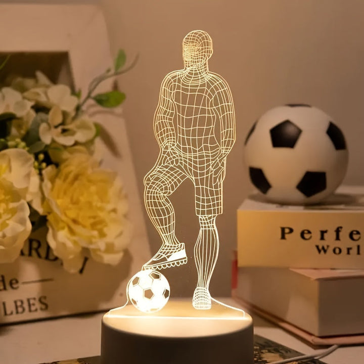 Upplyst 3D lampa med fotbollstema placerad på skrivbord som cool inredning