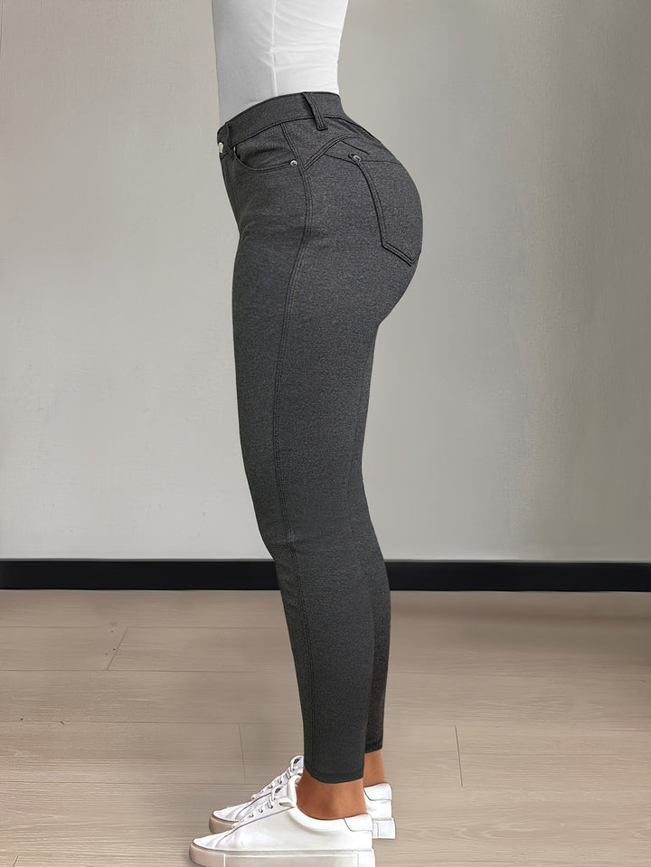 Blå slitna skinny jeans med hög midja och trendig look