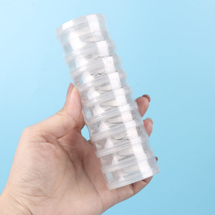 Ekologiska, alkoholfria handservetter, designade för resor, ej förfuktade, runda vita i kompakt plastförpackning.