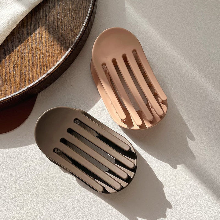 "Elegant akryl hårklypa för alla hårtyper, stilren design i flera färger, hållbar och flexibel accessoar."